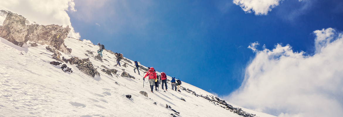 High Altitude Mountaineering Students Hike Up the Snow